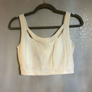 Woman’s Bebe white stretch crop top size extra small
